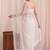 Off white floral sequinned net designer saree