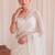 Off white floral sequinned net designer saree