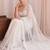 Off white floral sequinned net designer saree