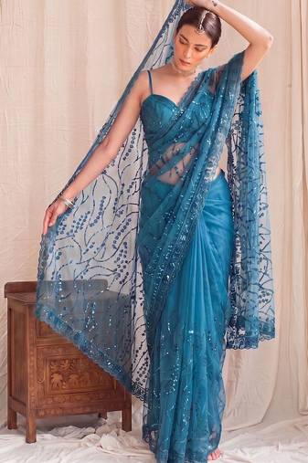 Teal floral sequinned net designer saree