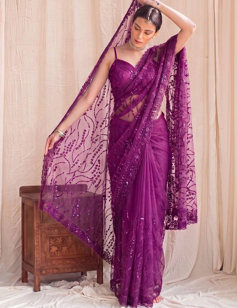 Purple floral sequinned net designer saree