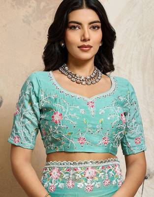 Turquoise embroidered saree with unstitched blouse 4