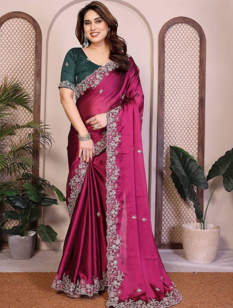 Magenta magenta rangoli silk embroidery saree