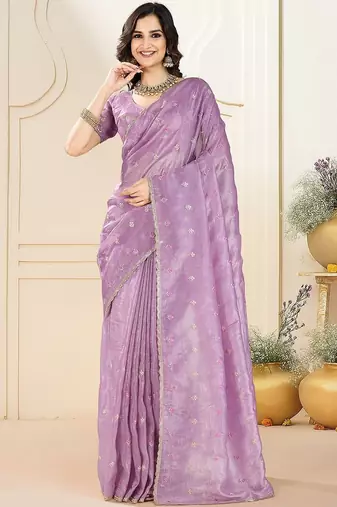 Purple ethnic embroidered festive wear saree with matching blouse
