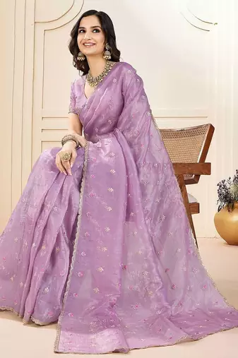 Purple ethnic embroidered festive wear saree with matching blouse