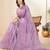 Purple ethnic embroidered festive wear saree with matching blouse
