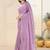 Purple ethnic embroidered festive wear saree with matching blouse