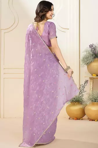 Purple ethnic embroidered festive wear saree with matching blouse