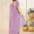 Purple ethnic embroidered festive wear saree with matching blouse