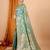 Sea green ethnic motifs woven design zari banarasi saree with unstitched blouse