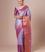 Lavender woven design kanjeevaram silk saree with blouse piece