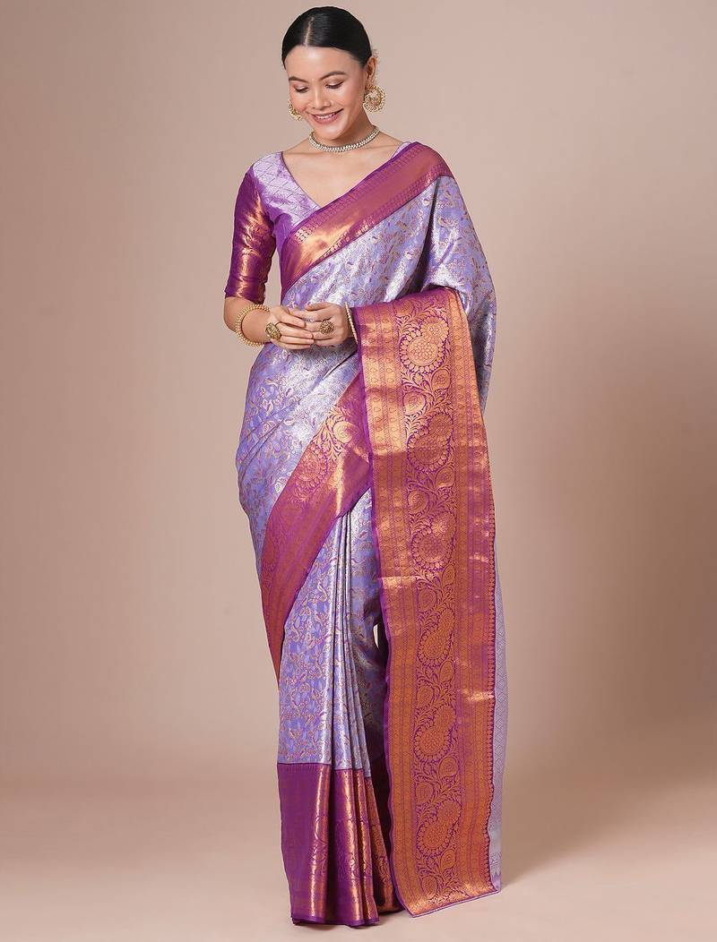 Lavender woven design kanjeevaram silk saree with blouse piece