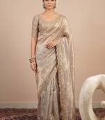 Gold embellished sequinned tissue designer saree