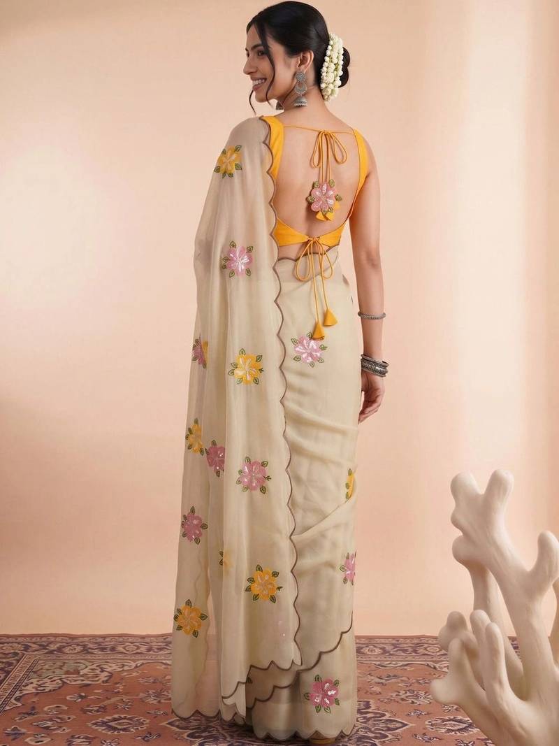 Cream embellished embroidered poly georgette designer saree