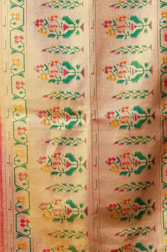 Pink woven design zari tissue saree