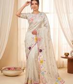 Women's cream embroidery tissue designer saree with blouse