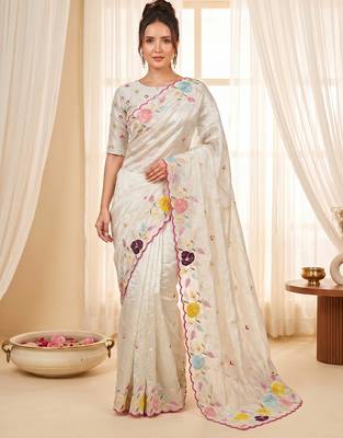 Women's cream embroidery tissue designer saree with blouse 2
