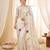 Women's cream embroidery tissue designer saree with blouse