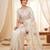 Women's cream embroidery tissue designer saree with blouse