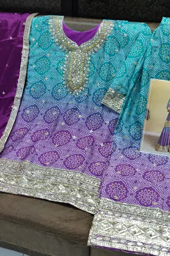 Turquoise blue heavy chinon printed embroidered palazzo suit
