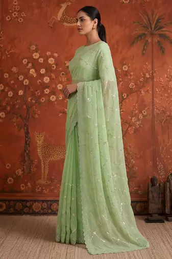 Green chiffon embroidered saree with beads