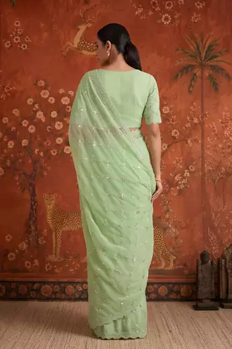 Green chiffon embroidered saree with beads
