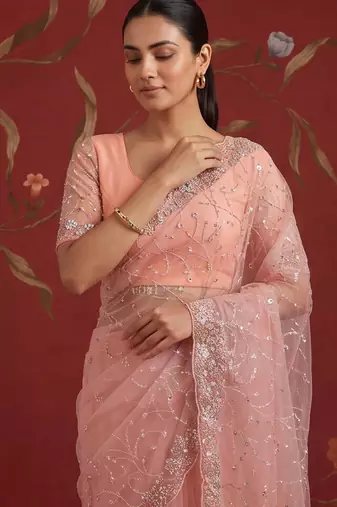 Peach net embroidered saree with beads