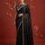 Black satin embroidered saree with zari work
