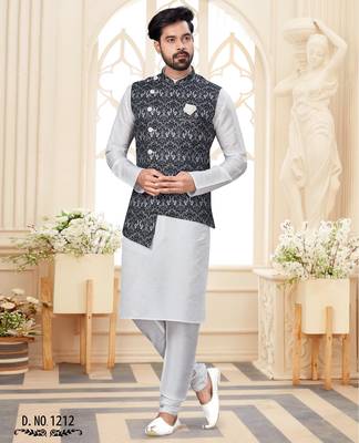 Maroon kurta and trousers paired with blue waistcoat featuring an intricate red pattern, gold-tone buttons 1