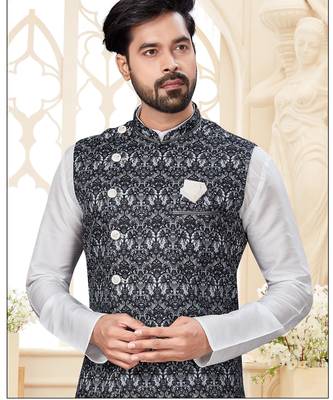 Maroon kurta and trousers paired with blue waistcoat featuring an intricate red pattern, gold-tone buttons 2