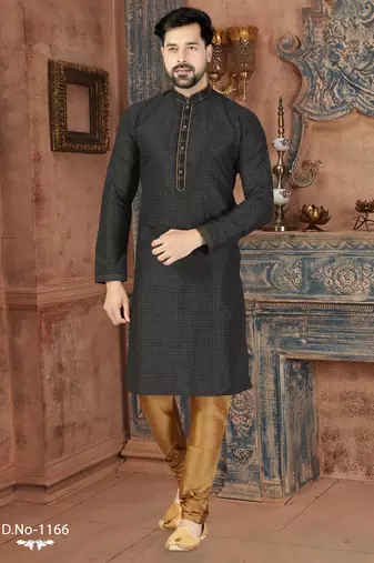 A black printed kurta with a subtle gold geometric pattern and gold detailing on the collar, placket, and cuffs, paired
