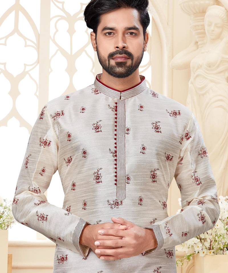 Off white printed kurta with scattered red floral motifs and striped detailing on the collar, placket, and cuffs,