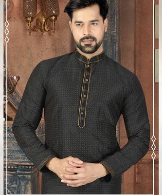 A black printed kurta with a subtle gold geometric pattern and gold detailing on the collar, placket, and cuffs, paired 2