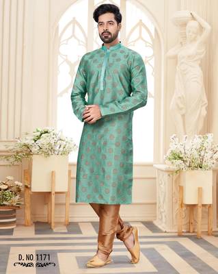A teal blue printed kurta with repeating floral medallions in muted gold and rust, finished 1