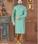 A sea-green printed kurta with a subtle gold diamond pattern, finished with a matching band collar and button placket