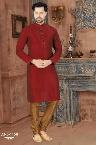 A rich maroon printed kurta with a subtle geometric pattern and fine gold detailing along the collar, placket, and cuffs