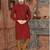 A rich maroon printed kurta with a subtle geometric pattern and fine gold detailing along the collar, placket, and cuffs