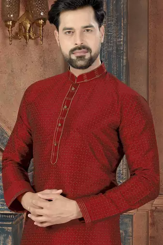A rich maroon printed kurta with a subtle geometric pattern and fine gold detailing along the collar, placket, and cuffs