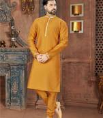 Mustard kurta with a clean silhouette and contrasting floral detailing along the collar, placket and cuffs
