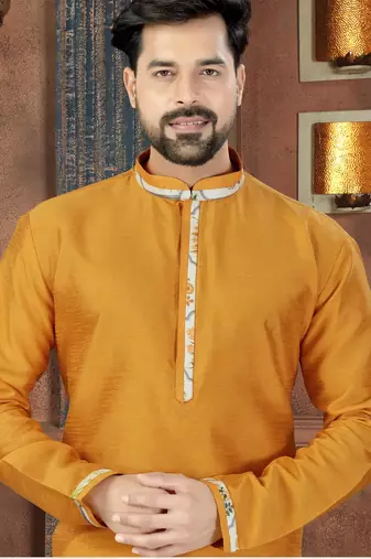 Mustard kurta with a clean silhouette and contrasting floral detailing along the collar, placket and cuffs