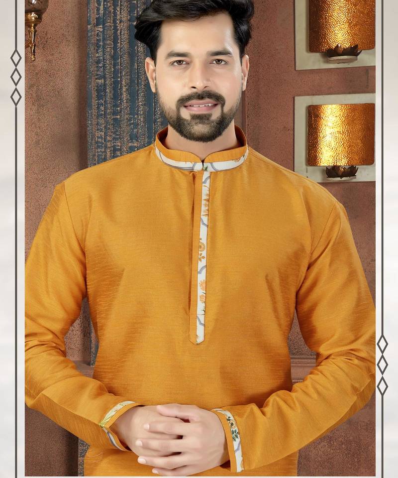 Mustard kurta with a clean silhouette and contrasting floral detailing along the collar, placket and cuffs