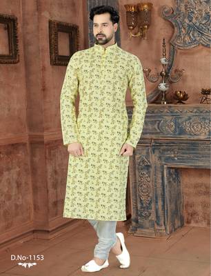 Yellow kurta with a delicate all-over botanical print, a neat band collar and coordinating buttons. 1