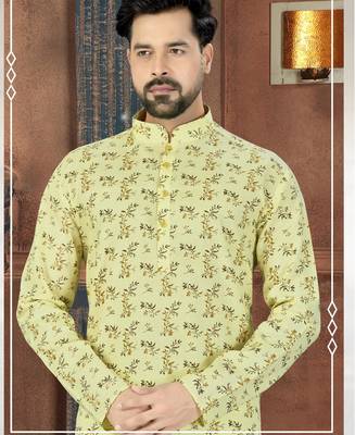 Yellow kurta with a delicate all-over botanical print, a neat band collar and coordinating buttons. 2