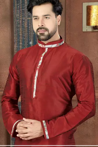 Deep red kurta with a subtle sheen and contrasting floral trim on the collar, placket and cuffs