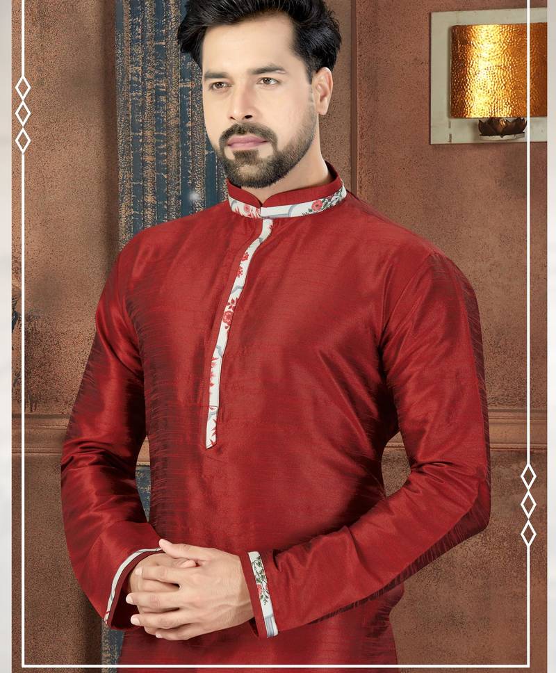 Deep red kurta with a subtle sheen and contrasting floral trim on the collar, placket and cuffs