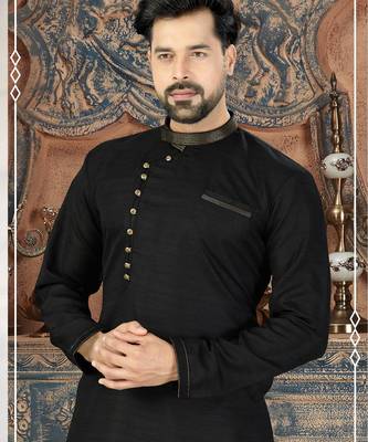 Black kurta with a subtle textured finish, featuring an asymmetrical line of gold-tone buttons. 2