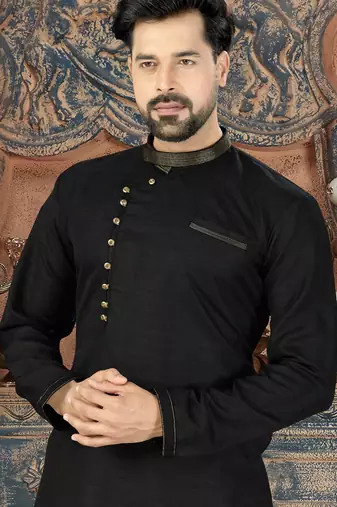 Black kurta with a subtle textured finish, featuring an asymmetrical line of gold-tone buttons.