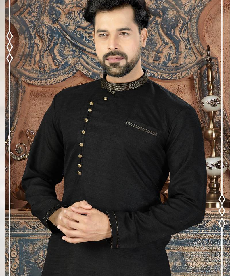 Black kurta with a subtle textured finish, featuring an asymmetrical line of gold-tone buttons.