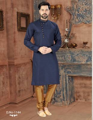 Navy-blue kurta with a subtle textured finish, an asymmetrical row of gold-tone buttons. 1