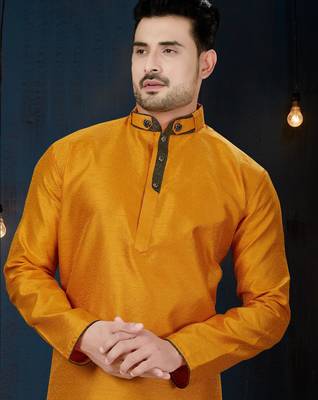 Mustard kurta with a subtle textured finish, accented by a dark embroidered band collar and placket. 2